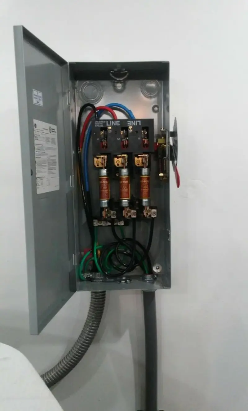 Three-phase disconnect switch installed for Smoke Detector Installation in Becker